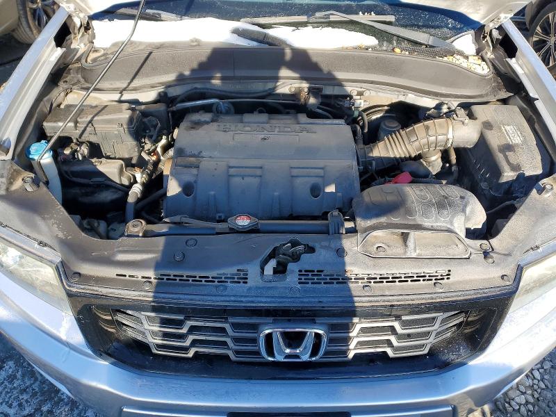 Photo 11 from auction – 2014 HONDA RIDGELINE with VIN 5FPYK1F61EB011376