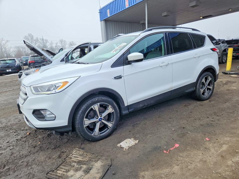 FORD ESCAPE 2018 with VIN 1FMCU9HD7JUC32906 - Photo from auction