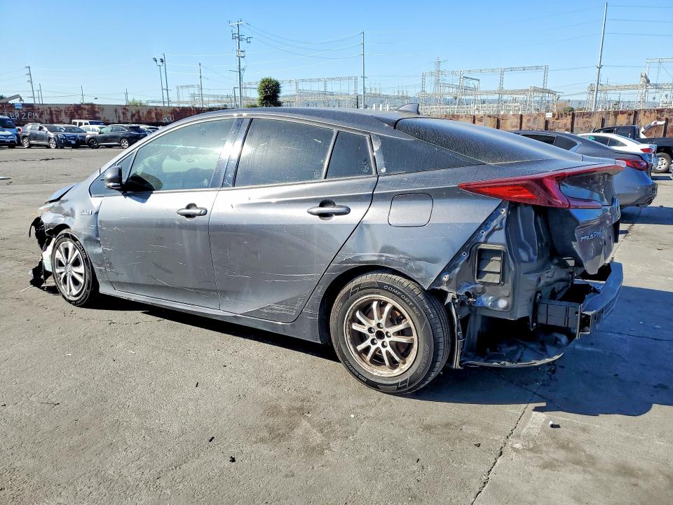 Photo 2 from auction – 2018 TOYOTA PRIUS PRIM with VIN JTDKARFP4J3088002