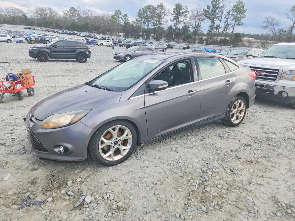 FORD FOCUS 2014 with VIN 1FADP3J24EL435551 - Photo from auction