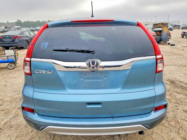Photo 6 from auction – 2016 HONDA CR-V with VIN 2HKRM3H57GH563038