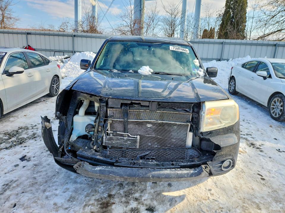 Фото 5 с аукциона – 2013 HONDA PILOT EXLN с VIN 5FNYF4H70DB047983