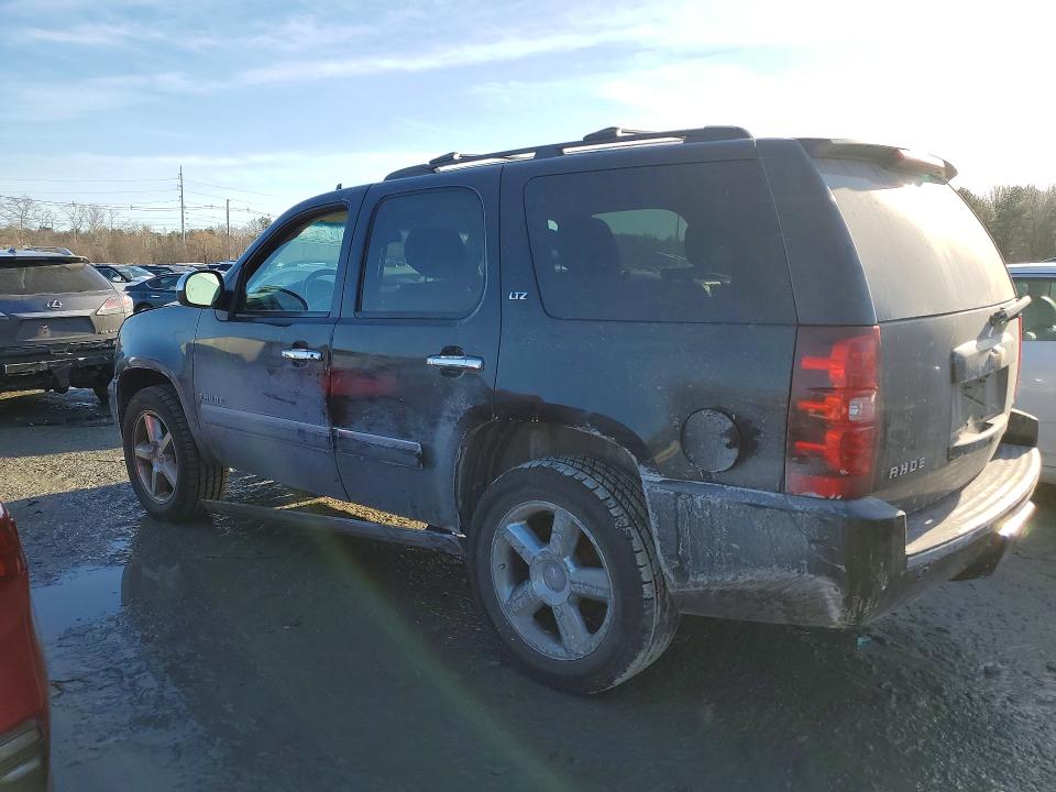 Photo 2 from auction – 2011 CHEVROLET TAHOE with VIN 1GNSKCE02BR357053
