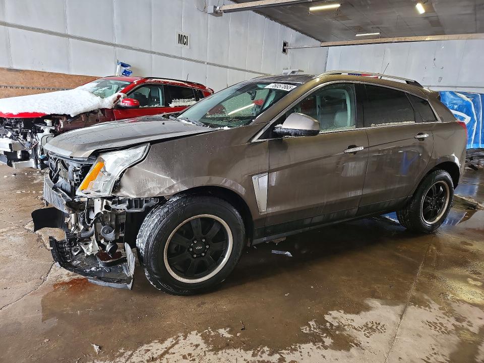 Photo 1 from auction – 2014 CADILLAC SRX LUXURY with VIN 3GYFNEE39ES676971