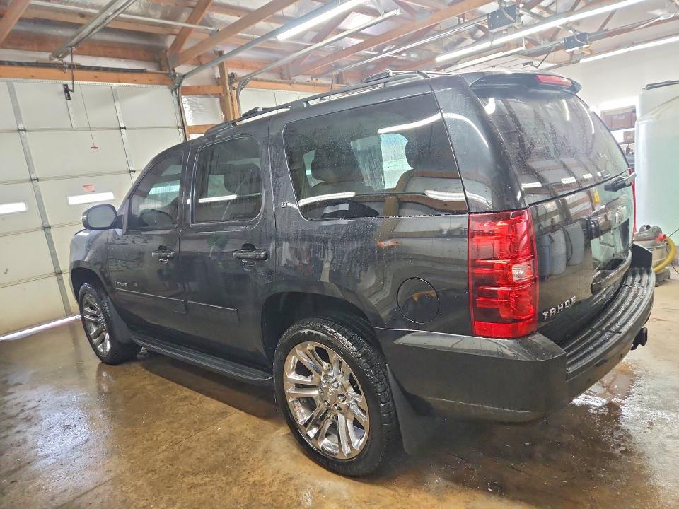 Photo 2 from auction – 2011 CHEVROLET TAHOE K150 with VIN 1GNSKBE01BR325060