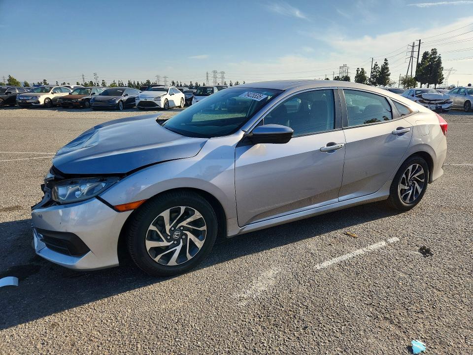 HONDA CIVIC 2016 with VIN 2HGFC2F75GH537214 - Photo from auction