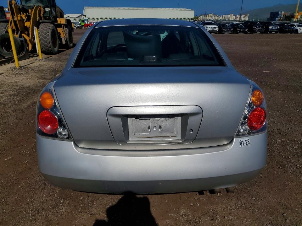 Photo 6 from auction – 2002 NISSAN ALTIMA with VIN 1N4AL11D32C108526