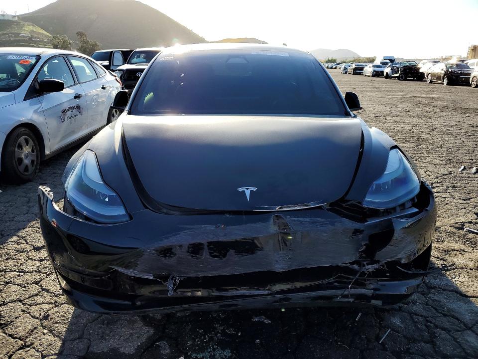 Photo 5 from auction – 2021 TESLA MODEL 3 with VIN 5YJ3E1EA3MF045396