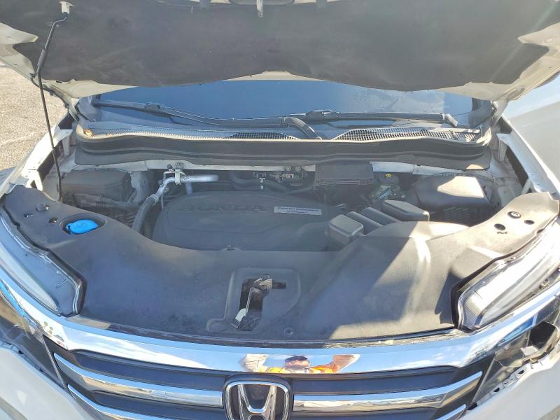 Photo 12 from auction – 2018 HONDA PILOT with VIN 5FNYF5H12JB028641