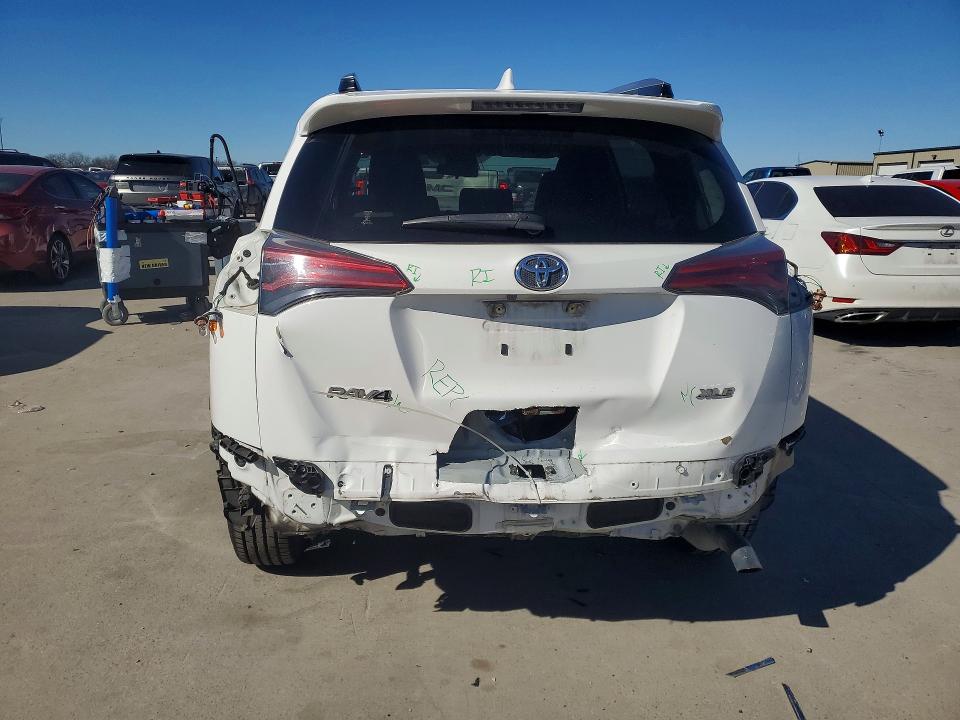 Photo 6 from auction – 2017 TOYOTA RAV4 XLE with VIN JTMWFREV8HD098233