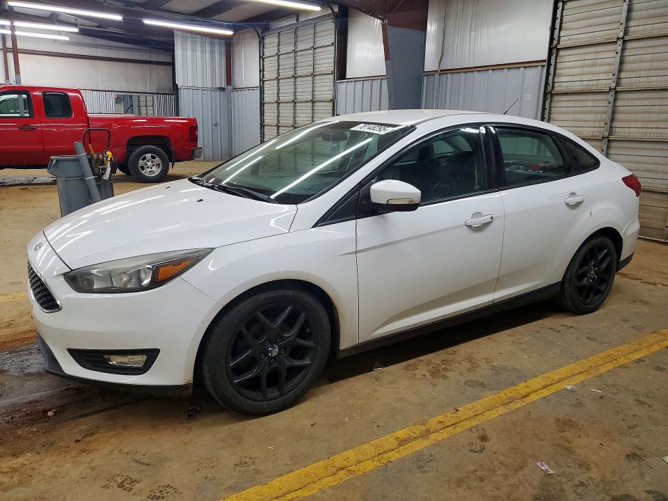 FORD FOCUS 2016 with VIN 1FADP3F21GL309563 - Photo from auction