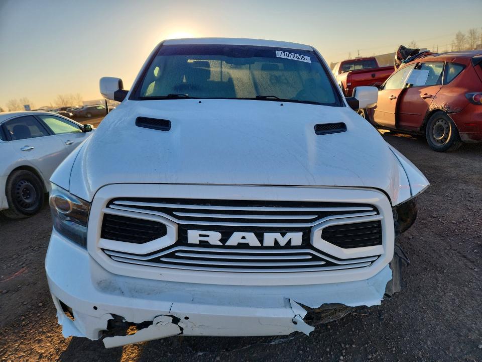 Photo 5 from auction – 2018 RAM 1500 with VIN 1C6RR7MT8JS247810