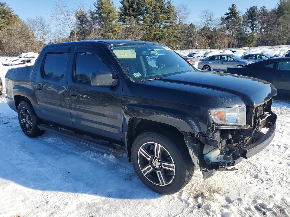 Photo 4 from auction – 2013 HONDA RIDGELINE with VIN 5FPYK1F76DB012420