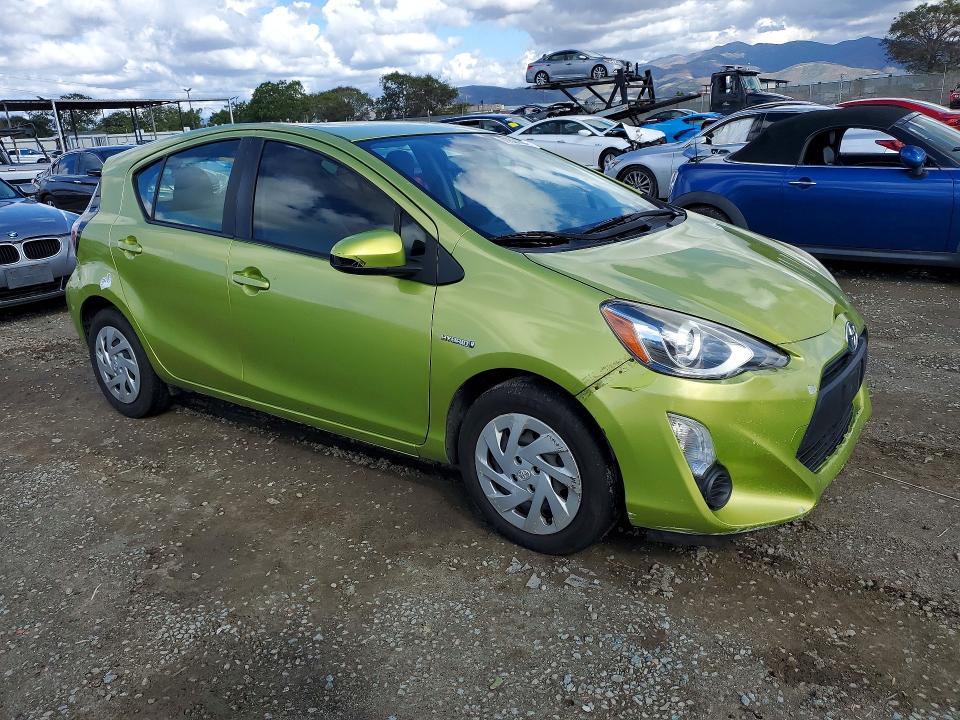 Photo 4 from auction – 2015 TOYOTA PRIUS C with VIN JTDKDTB39F1110201