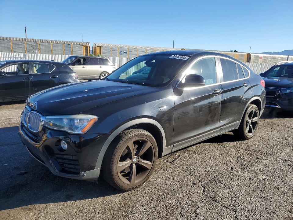 BMW X4 2015 с VIN 5UXXW3C54F0F89327 - Фото с аукциона