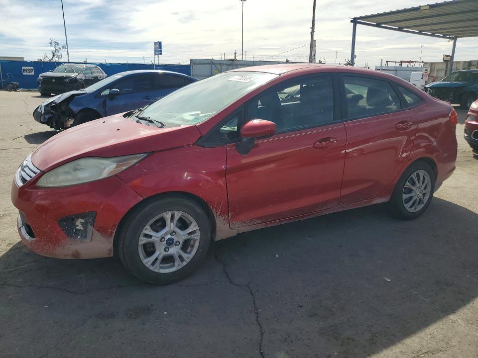 FORD FIESTA 2011 with VIN 3FADP4BJ2BM228565 - Photo from auction