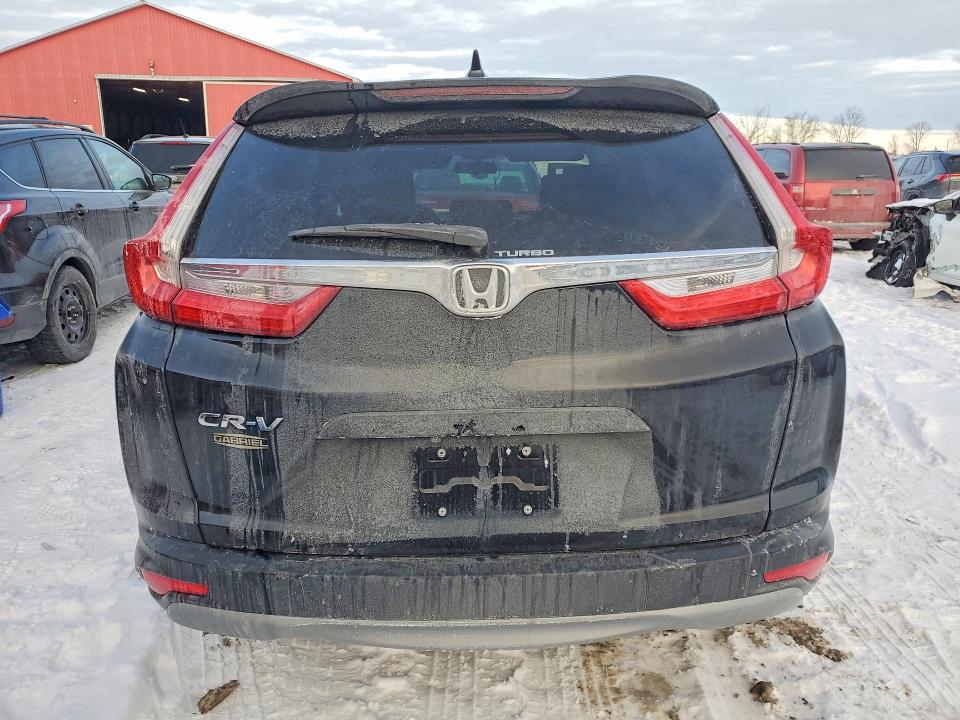 Photo 6 from auction – 2019 HONDA CR-V with VIN 2HKRW1H30KH002976