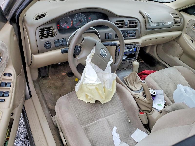 Photo 8 from auction – 2001 MAZDA 626 with VIN 1YVGF22C815237138