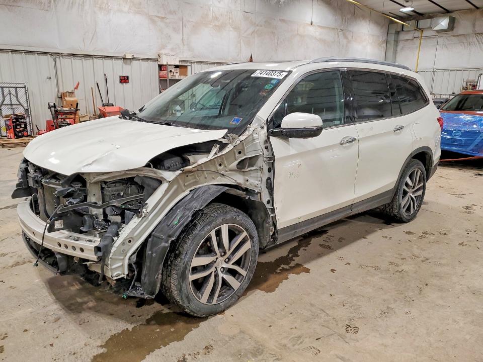 HONDA PILOT ELIT 2017 with VIN 5FNYF6H05HB098884 - Photo from auction