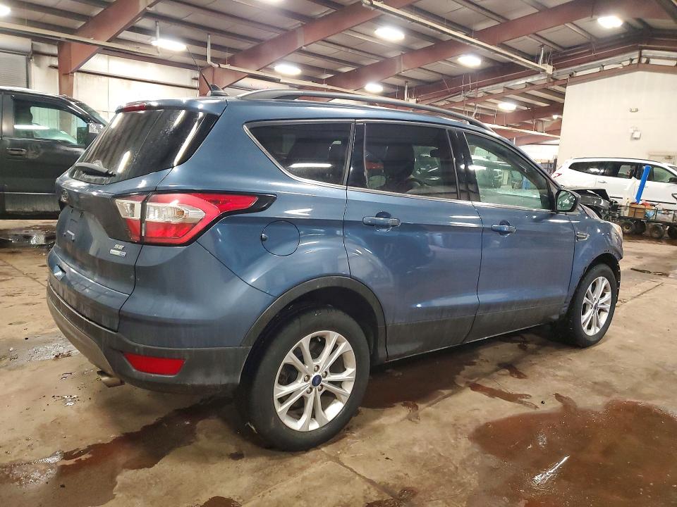 Photo 3 from auction – 2018 FORD ESCAPE with VIN 1FMCU9GD3JUC01248