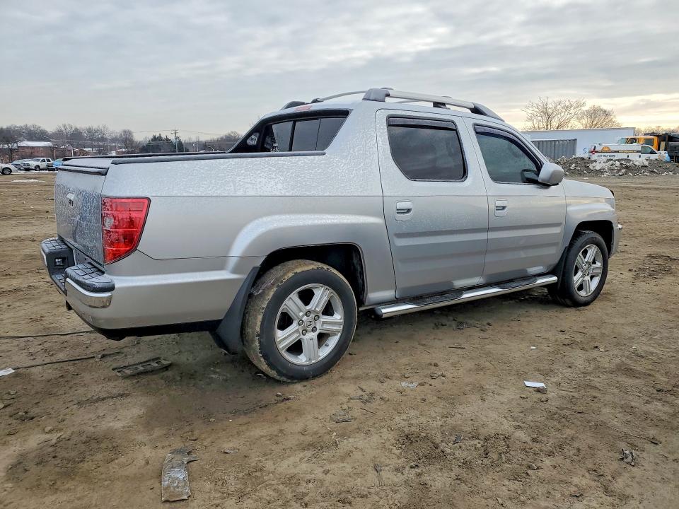 Photo 3 from auction – 2011 HONDA RIDGELINE with VIN 5FPYK1F55BB005163