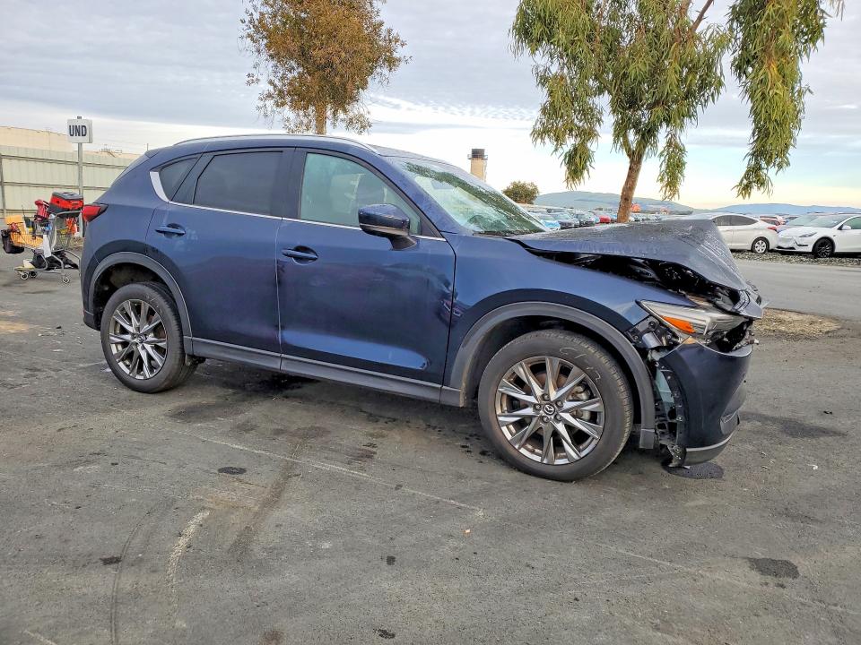 Photo 4 from auction – 2021 MAZDA CX-5 SIGNA with VIN JM3KFBEY0M0423806