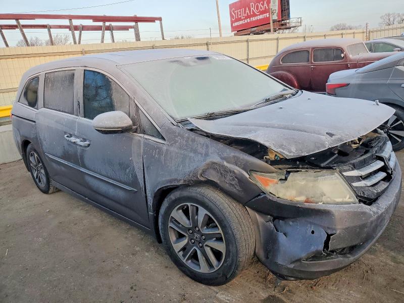 Photo 4 from auction – 2014 HONDA ODYSSEY with VIN 5FNRL5H96EB094831