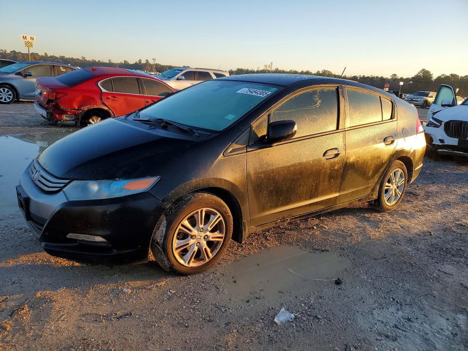HONDA INSIGHT 2010 with VIN JHMZE2H79AS043231 - Photo from auction