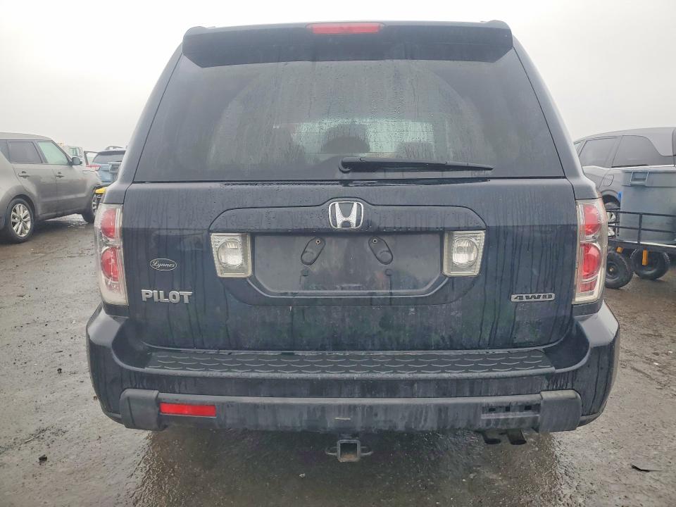Photo 6 from auction – 2006 HONDA PILOT with VIN 2HKYF185X6H558232