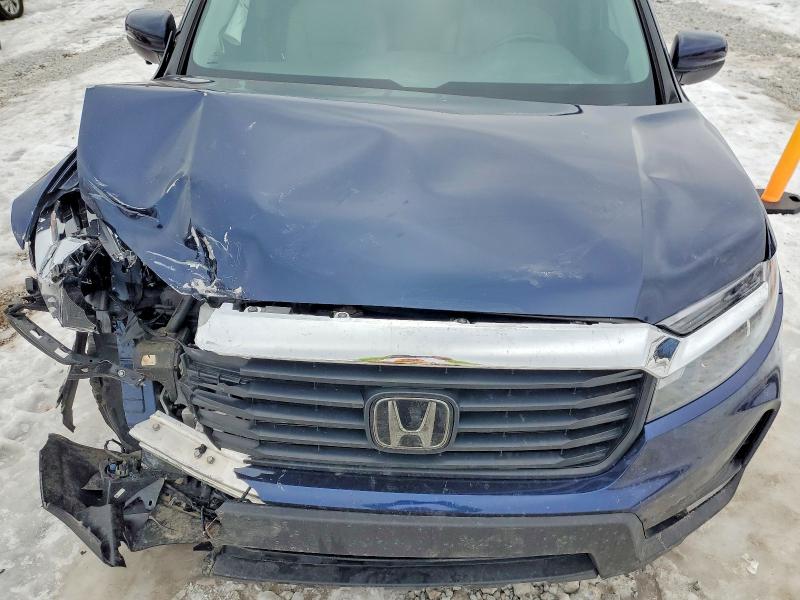 Photo 11 from auction – 2021 HONDA RIDGELINE with VIN 5FPYK3F53MB017620