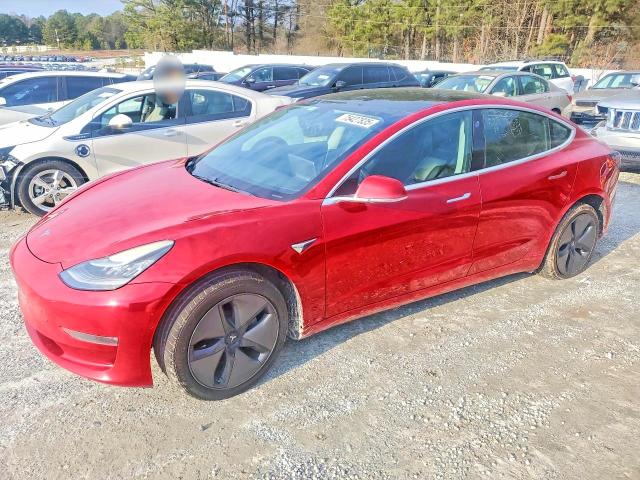TESLA MODEL 3 2018 with VIN 5YJ3E1EA4JF007090 - Photo from auction