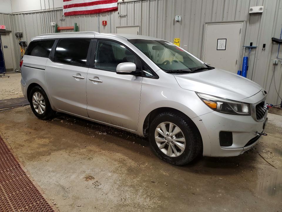 Photo 4 from auction – 2015 KIA SEDONA with VIN KNDMB5C18F6080229