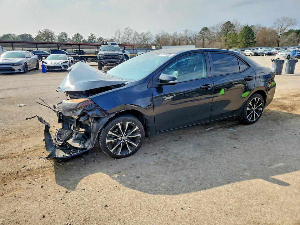 TOYOTA COROLLA 2018 with VIN 5YFBURHE4JP808599 - Photo from auction