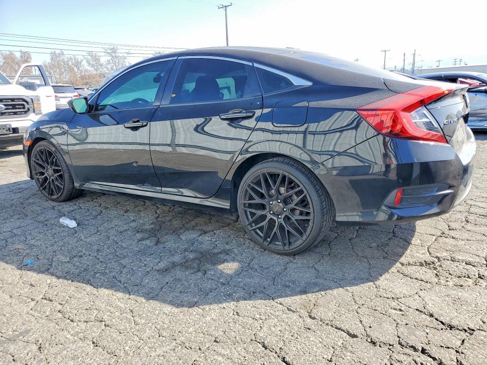 Photo 2 from auction – 2017 HONDA CIVIC LX with VIN 19XFC2F54HE011389