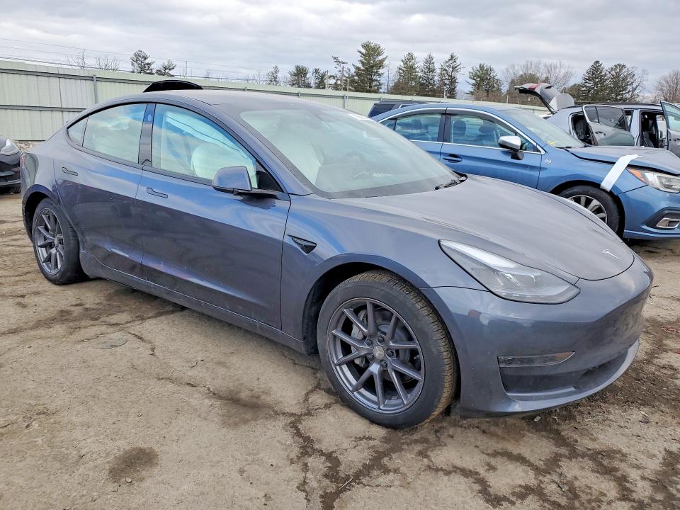 Photo 4 from auction – 2023 TESLA MODEL 3 with VIN 5YJ3E1EA4PF704137
