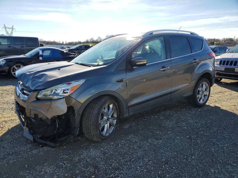 FORD ESCAPE 2014 with VIN 1FMCU0JX0EUB63806 - Photo from auction