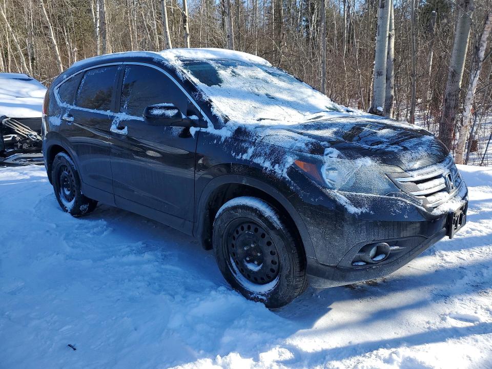 Photo 4 from auction – 2014 HONDA CR-V with VIN 2HKRM4H90EH128027