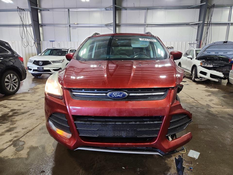 Photo 5 from auction – 2016 FORD ESCAPE with VIN 1FMCU9GX2GUA67769