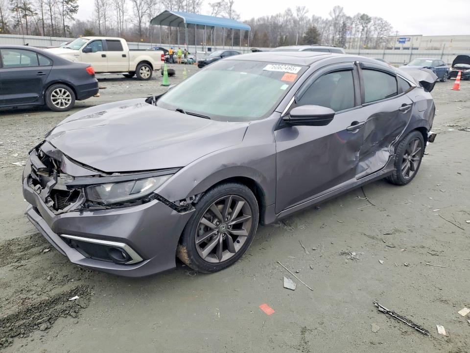 HONDA CIVIC 2020 with VIN 19XFC1F77LE002772 - Photo from auction