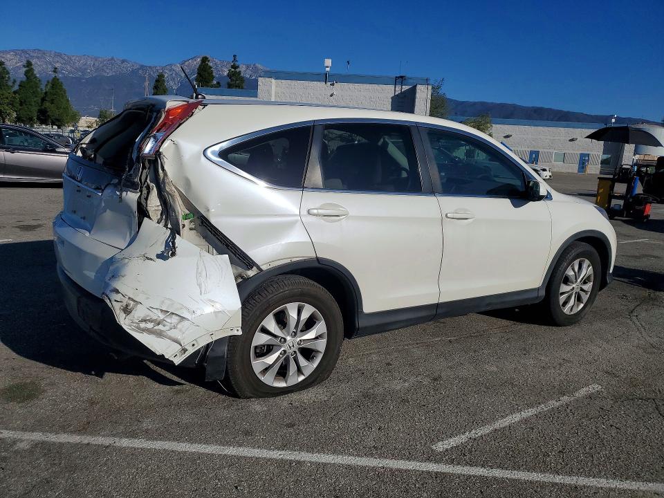 Photo 3 from auction – 2014 HONDA CR-V with VIN 5J6RM3H59EL024830