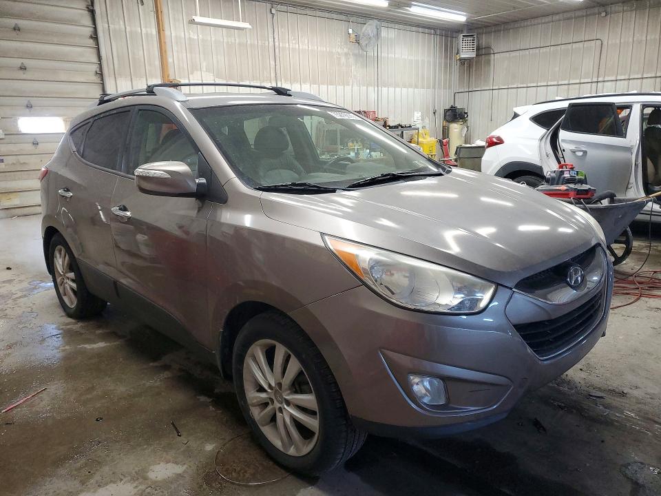 Photo 4 from auction – 2012 HYUNDAI TUCSON with VIN KM8JUCAC1CU369526