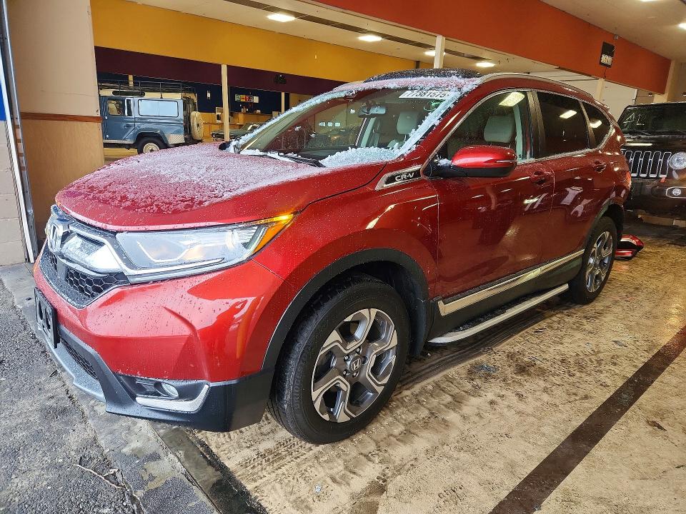 Photo 1 from auction – 2017 HONDA CR-V with VIN 5J6RW2H86HL032015