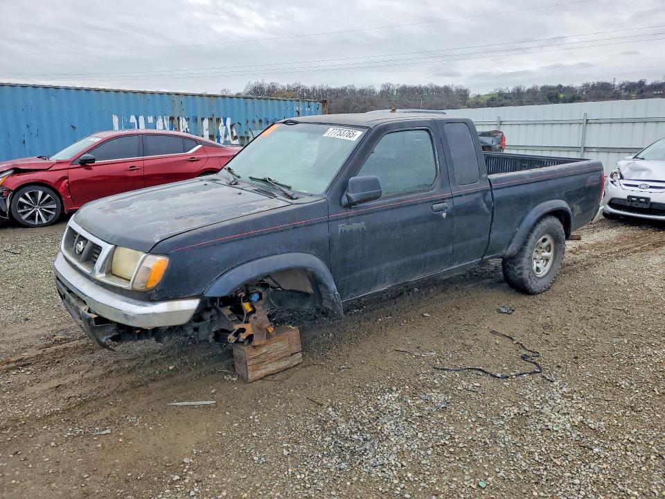 NISSAN FRONTIER 1999 with VIN 1N6ED26Y2XC313298 - Photo from auction