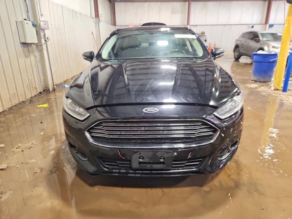 Foto 5 de la subasta – 2016 FORD FUSION con VIN 3FA6P0T97GR162336
