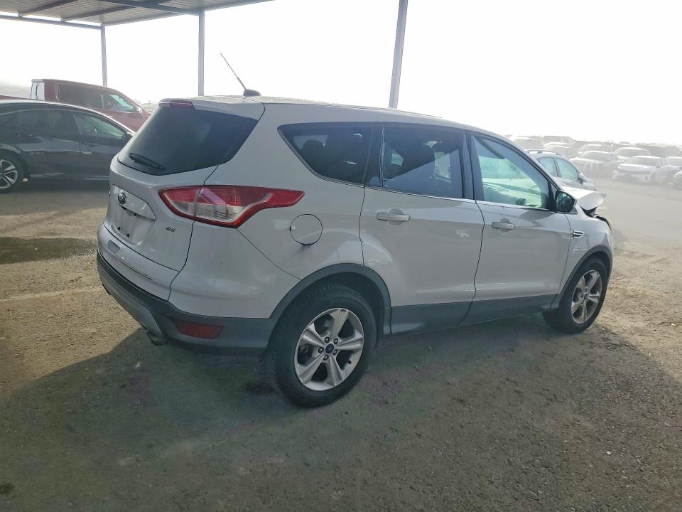 Photo 3 from auction – 2016 FORD ESCAPE with VIN 1FMCU0G79GUA70356