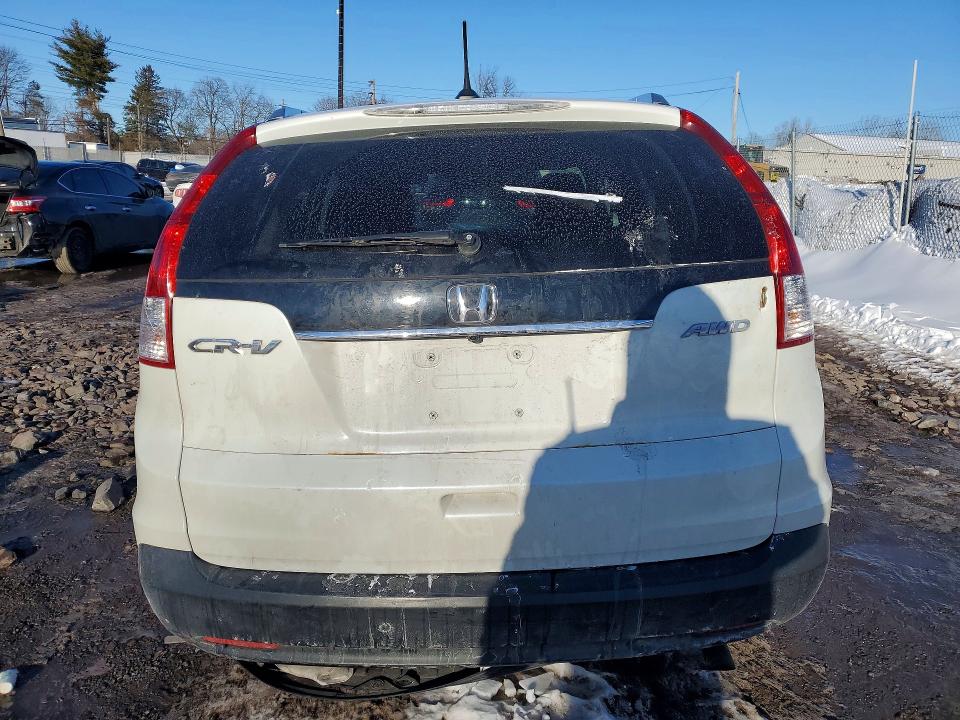 Photo 6 from auction – 2013 HONDA CR-V EXL with VIN 5J6RM4H74DL049026