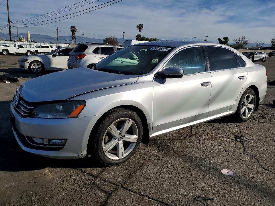 VOLKSWAGEN PASSAT 2015 with VIN 1VWAT7A34FC081585 - Photo from auction