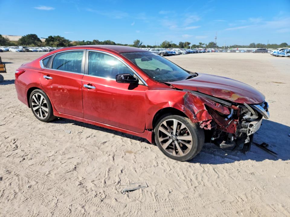 Photo 4 from auction – 2016 NISSAN ALTIMA 2.5 with VIN 1N4AL3AP1GC122065