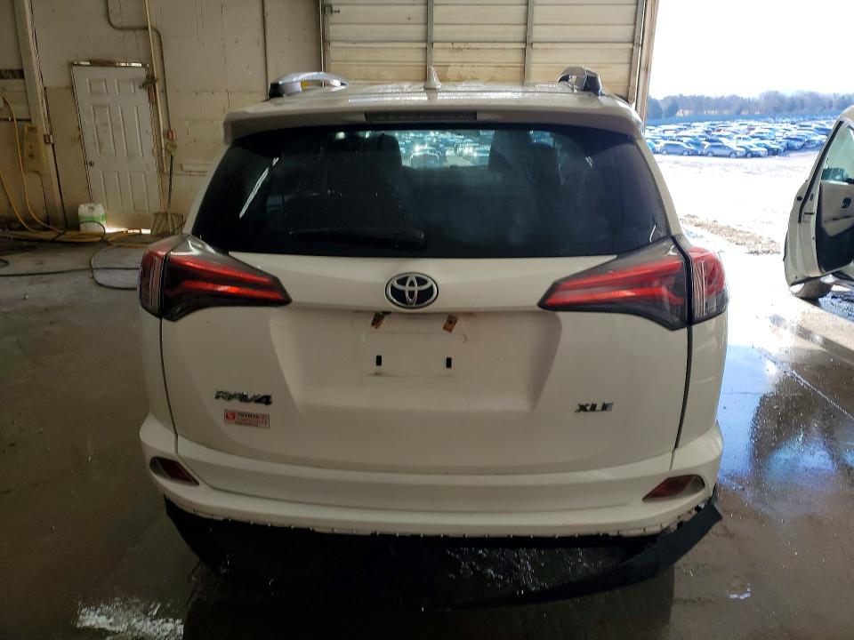 Photo 6 from auction – 2017 TOYOTA RAV4 XLE with VIN JTMWFREV6HJ714447
