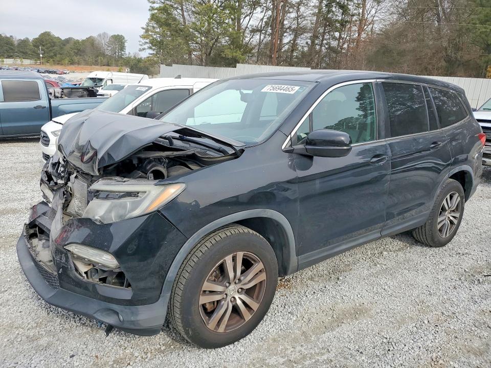 HONDA PILOT EXL 2016 with VIN 5FNYF5H52GB016288 - Photo from auction